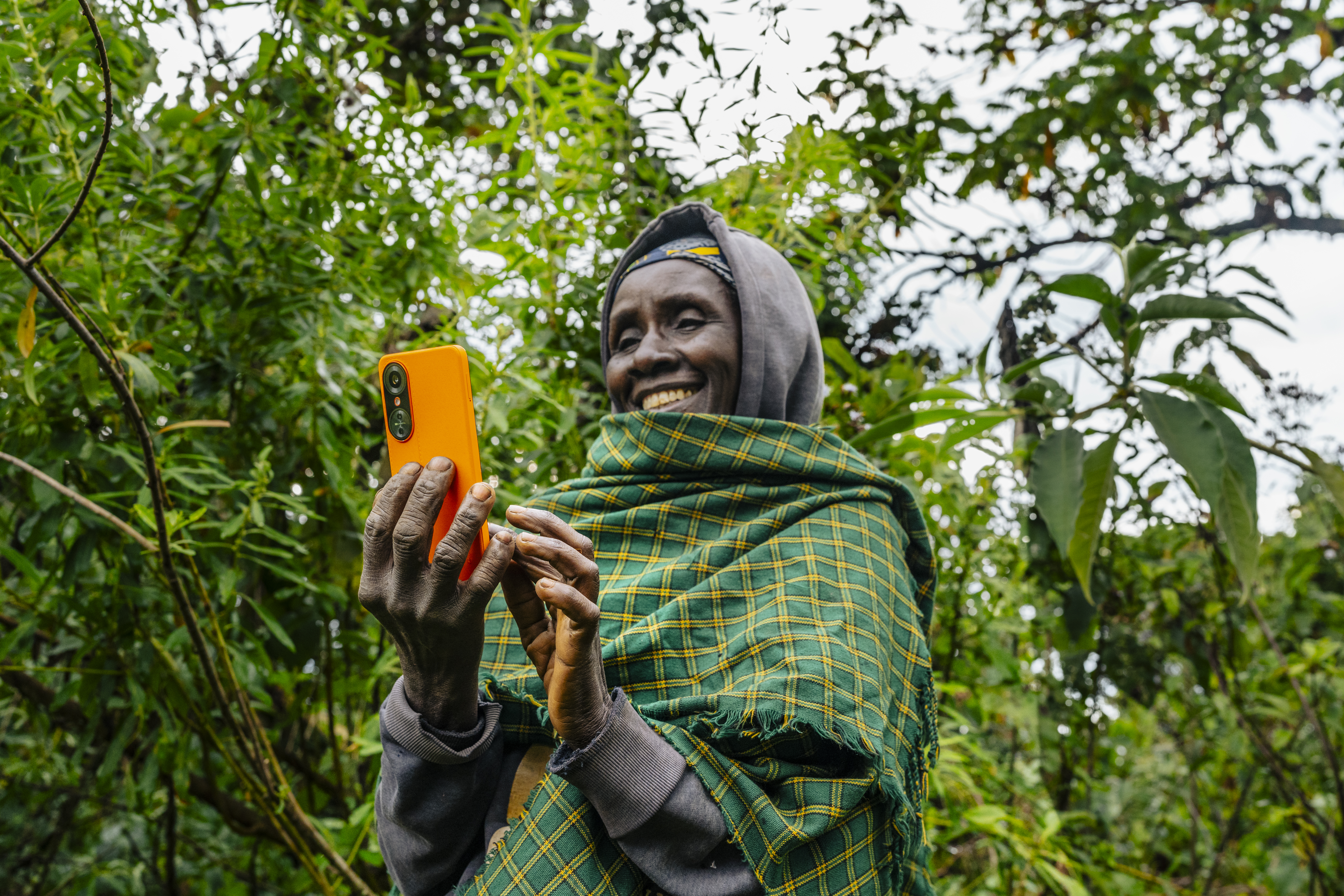 Shangazi agent with GOODSAM smartphone